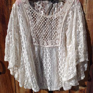 Vintage. Cute, romantic, and sexy sheer lace top.